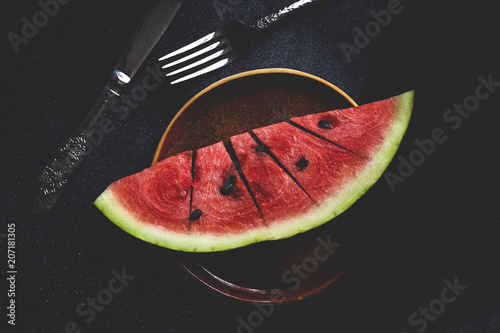 Close up of watermelon slice on plate photo