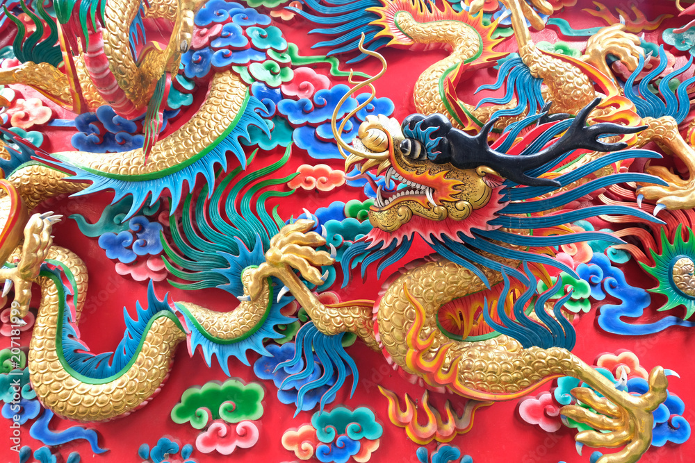 Fototapeta premium chinese dragon statue at the wall of temple in Thailand