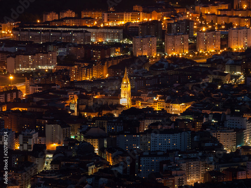 Night aerial view of Oviedo from mount Naranco with cathedral and old town