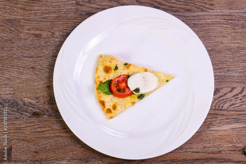 Pizza Caprese with basil Pizza Caprese with basil