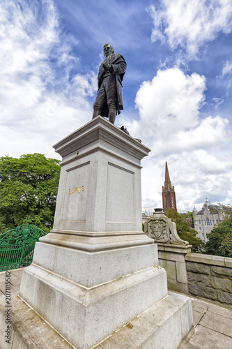 Blue Sky above the statue of Scottish poet Robert Burns in Aberdeen  Scotland.