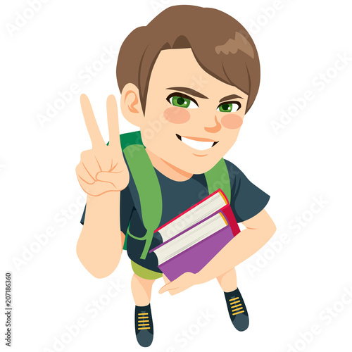 Young student boy holding b...