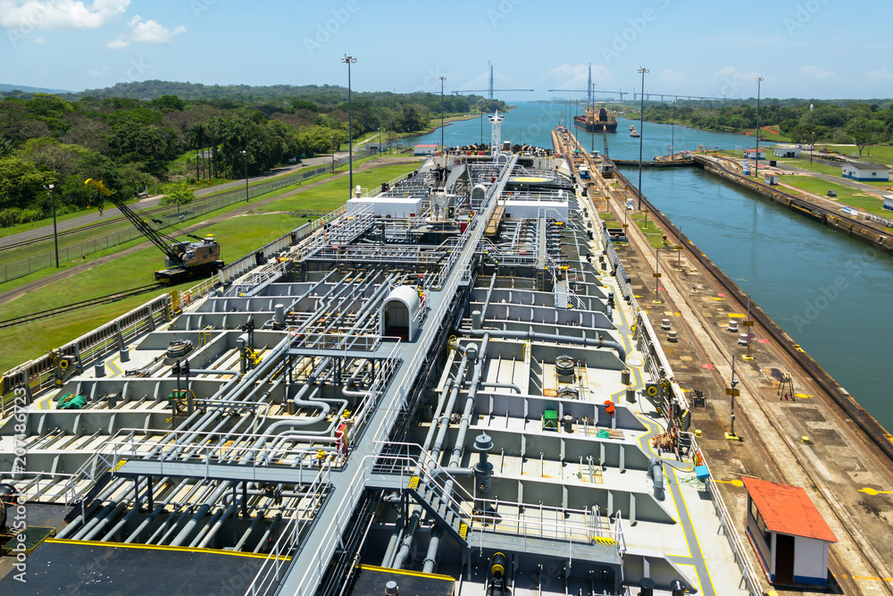 Oil product tanker is in Gatun lock of Panama Canal.