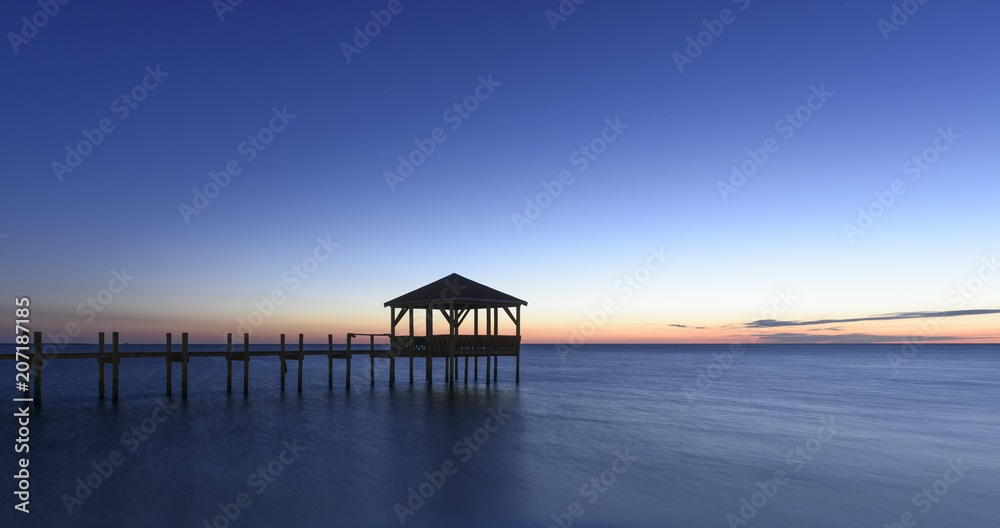 Calm Ocean at Twilight with Pier and Gazebo