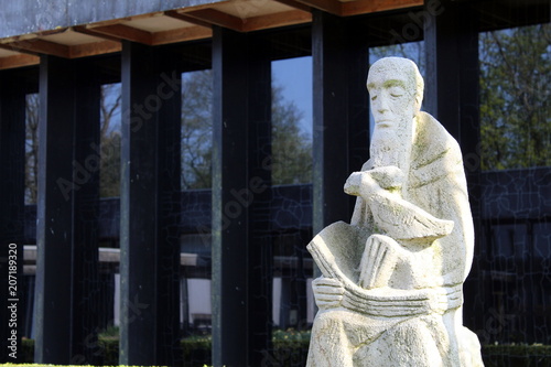Statue of St. Benedict of Nursia in front of the Benedictine Priory St. Ansgar in Nütschau, Travenbrück, Germany