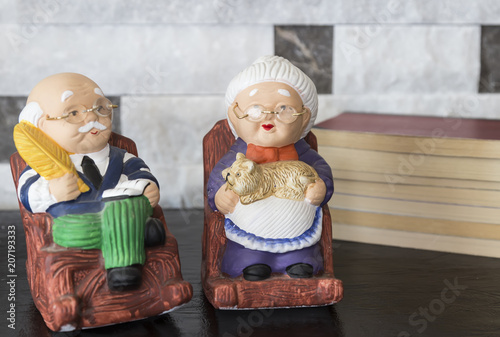 old lady and man figurine