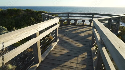 Attis point beach and lookout on Great Ocean Road, Australia, at sunset, stabilized dolly shot. photo