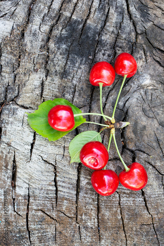 Cherry on a wooden background