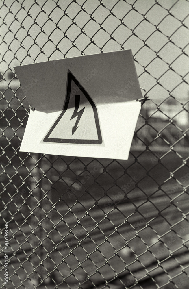 Danger sign on the fence Danger sign on the fence