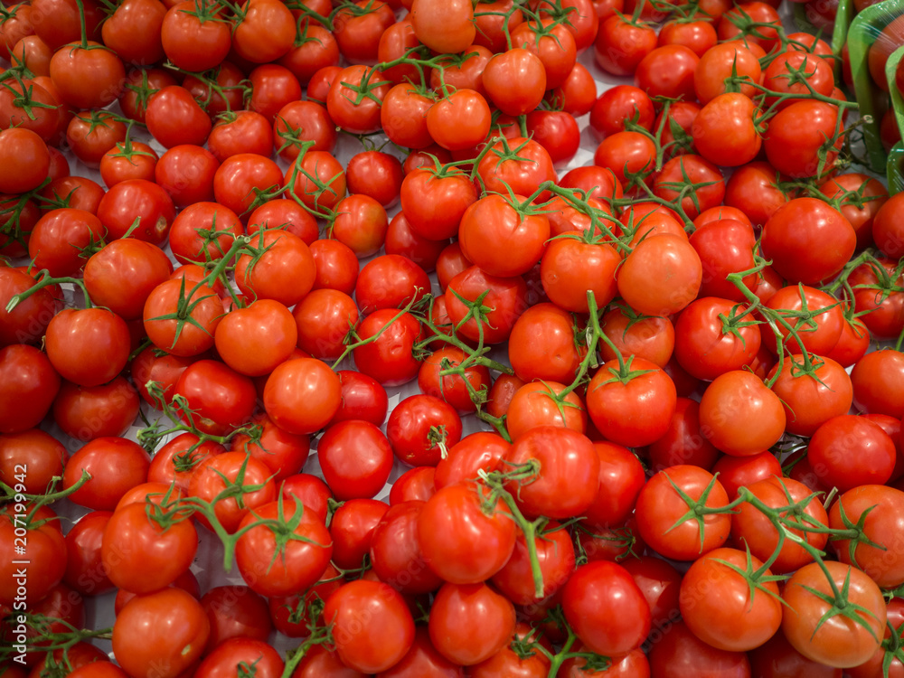 Fresh red tomatoes in the soupermarket Fresh red tomatoes in the soupermarket
