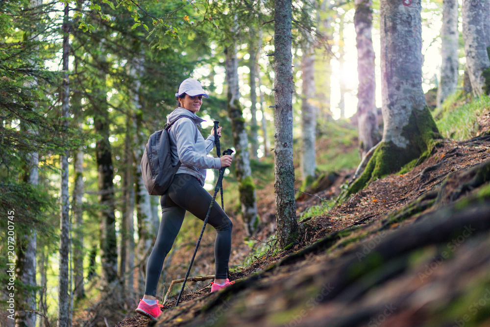 Female backpacker exploring nature Female backpacker exploring nature