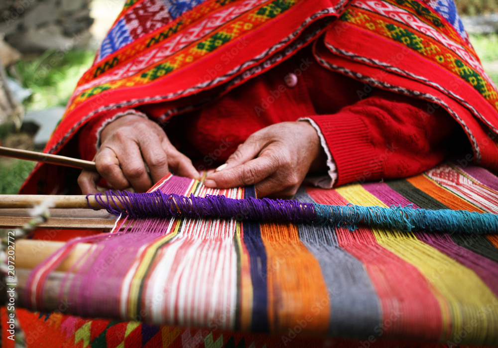 Close up of a woman weaving in Peru - obrazy, fototapety, plakaty 