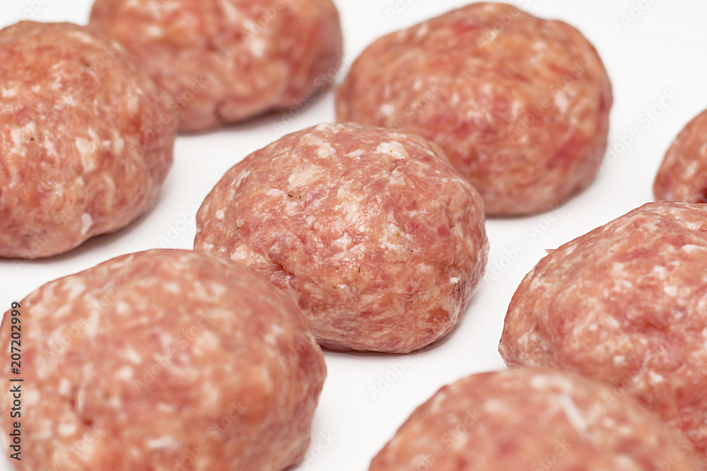 Meat minced red on white background. Meat minced red on white background.