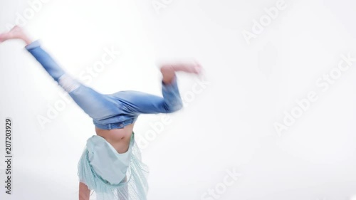 Young Girl Does Cartwheel Across Frame In Slow Motion