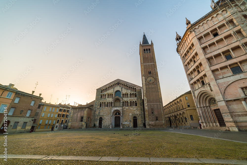 Parma, Emilia Romagna, Italy. Piazza Duomo with Cathedral, tower bell and Baptistery. Parma is famous for typical ham.