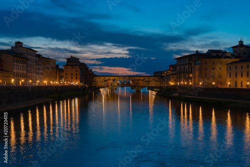 Florence, Italy. River Arno and famous bridge Ponte Vecchio at sunset from Piazzale Michelangelo in Florence (Firenze), Tuscany, Italy