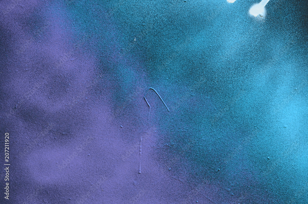 Street art. Abstract background image of a fragment of a colored graffiti painting in cosmic blue and violet tones - obrazy, fototapety, plakaty 