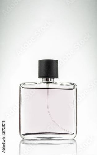 A bottle with perfumes.