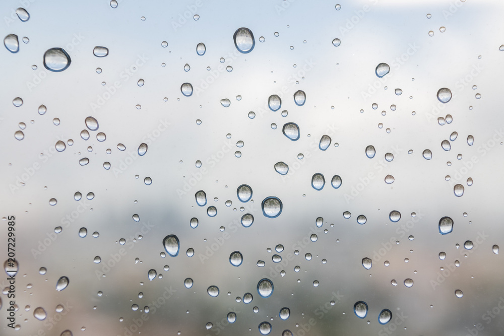 Rain drop on the window glass