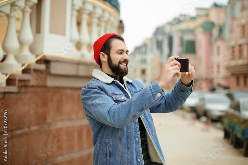 Handsome trendy hipster tak...