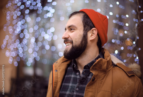 Handsome trendy hipster wal...