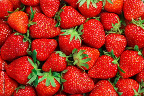 Many ripe red strawberries as background, closeup