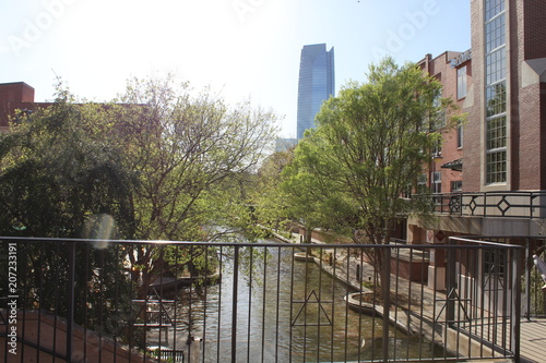 city boardwalk overlooking skyscraper