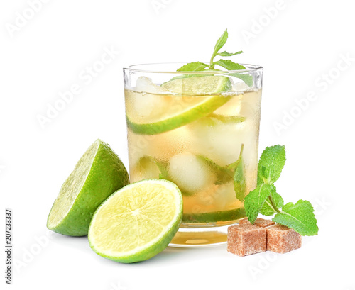 Glass of delicious mint julep cocktail on white background