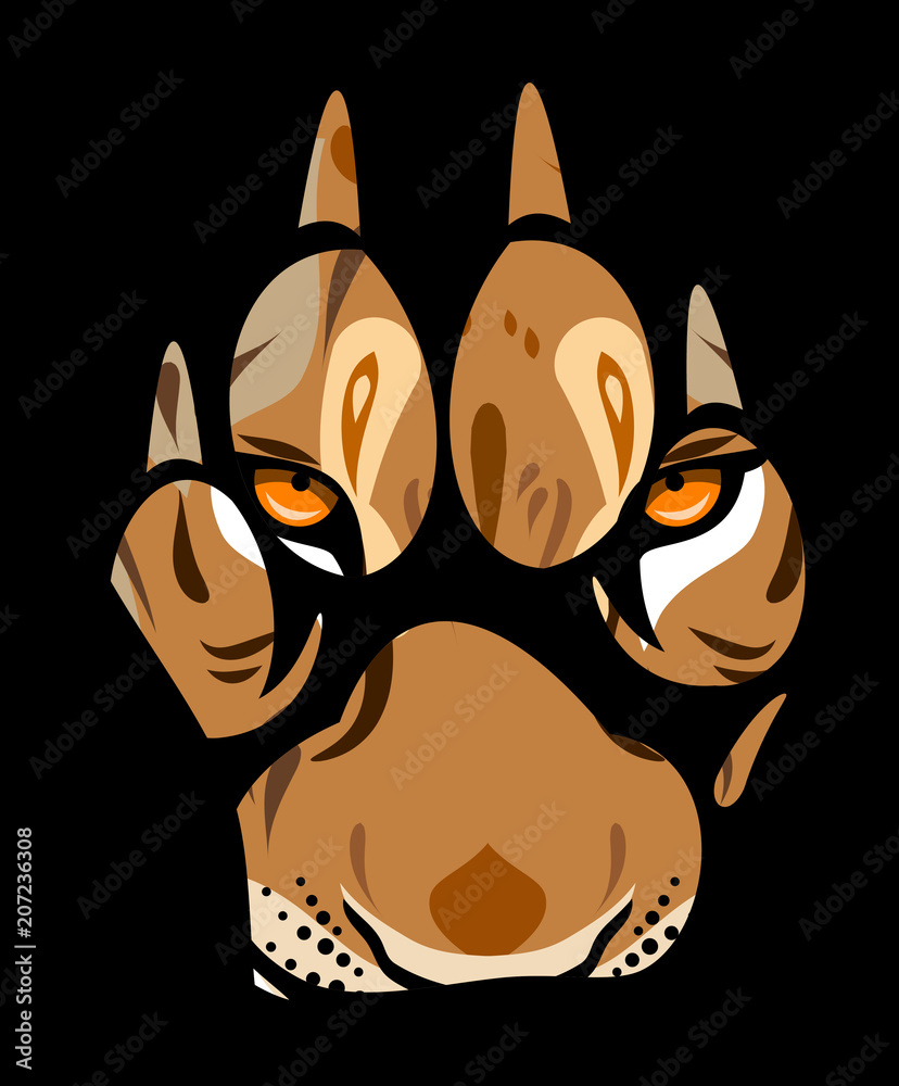 Fototapeta premium muzzle of a lioness in a paw print