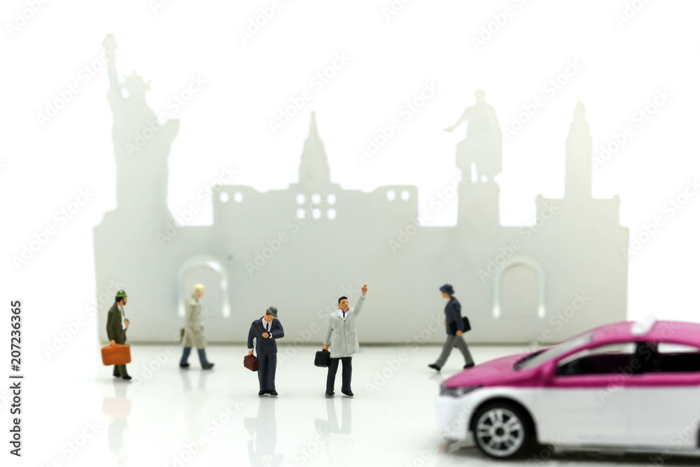 Miniature people : businessman waiting for a taxi in front of the airport,business meeting concept.