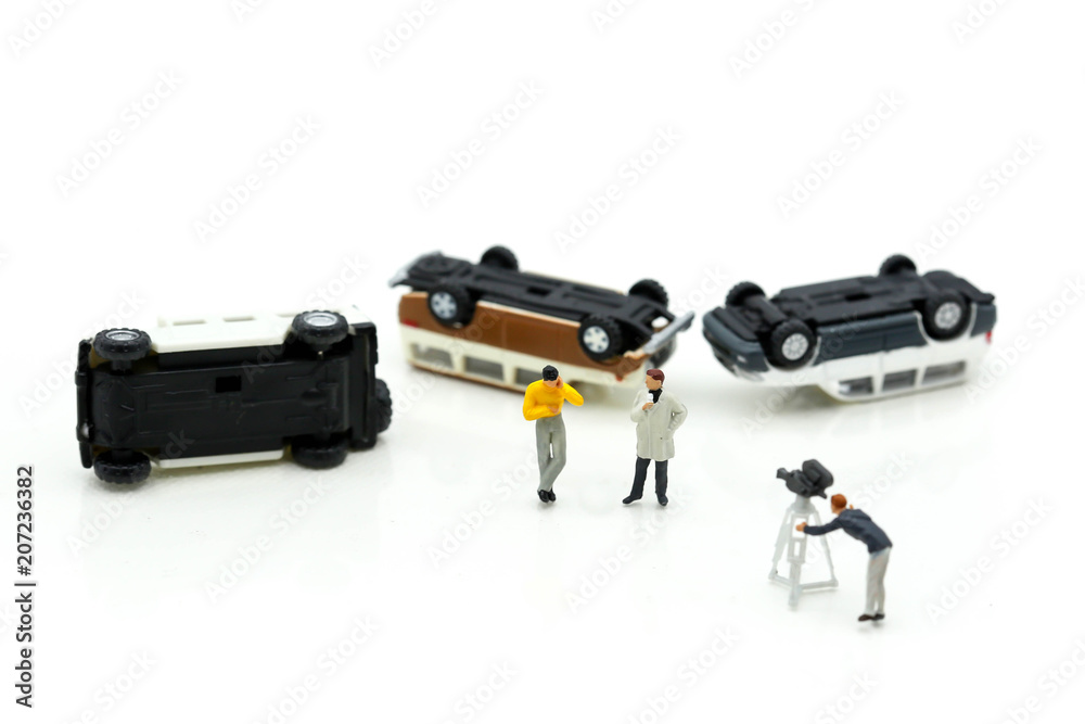 Miniature people : the small team of tv reporter of  car crash accident , production television concept.