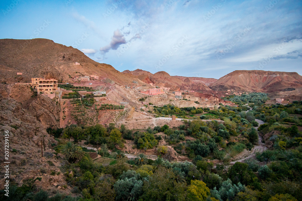 Fototapeta premium Aerial view of oasis and mountains in Dades Valley near Boumalne Dades village in Morocco