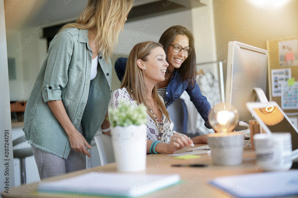 Start-up young women in office, co-working area Start-up young women in office, co-working area