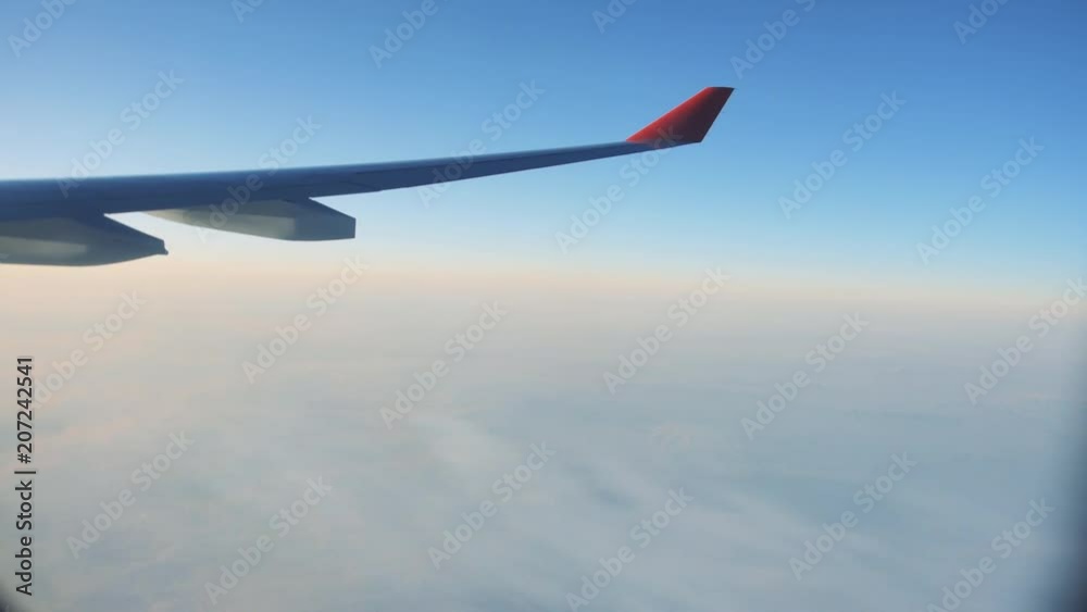 Wing of airplane from window. Wing of airplane from window.