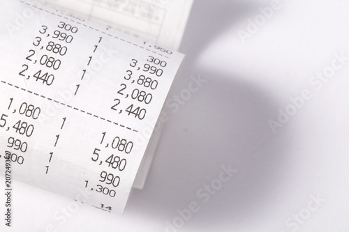 cash register receipts in a pile