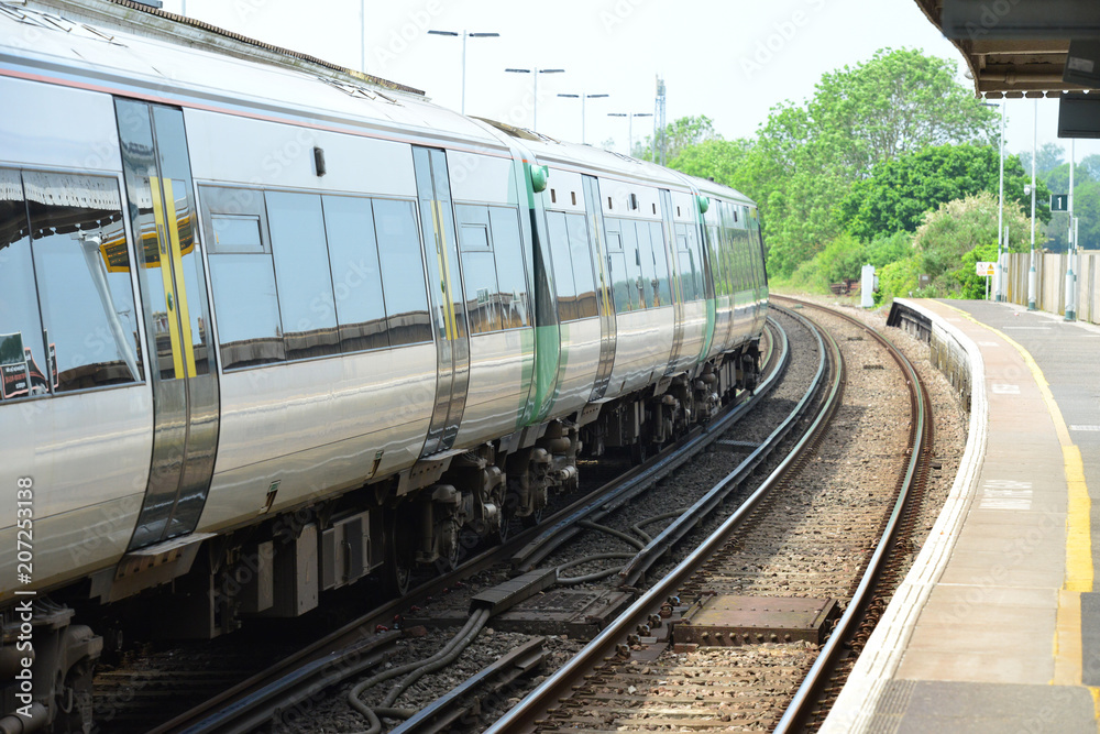 Fototapeta premium Train waiting in station in Uk