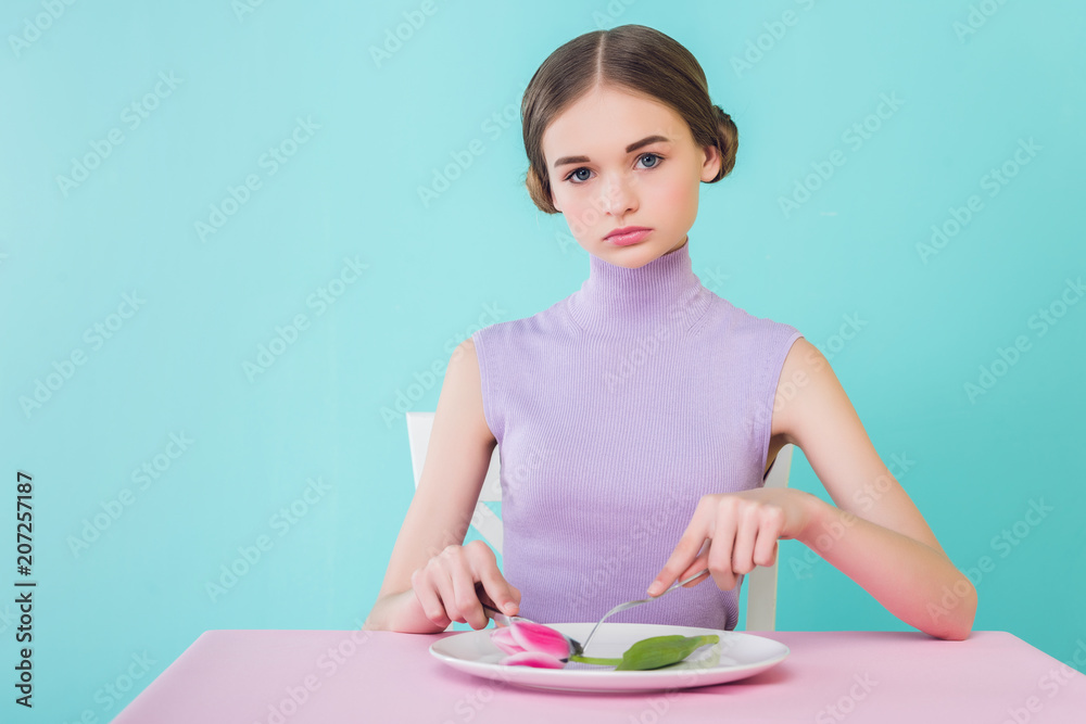 beautiful teen girl on diet eating tulip flower beautiful teen girl on diet eating tulip flower