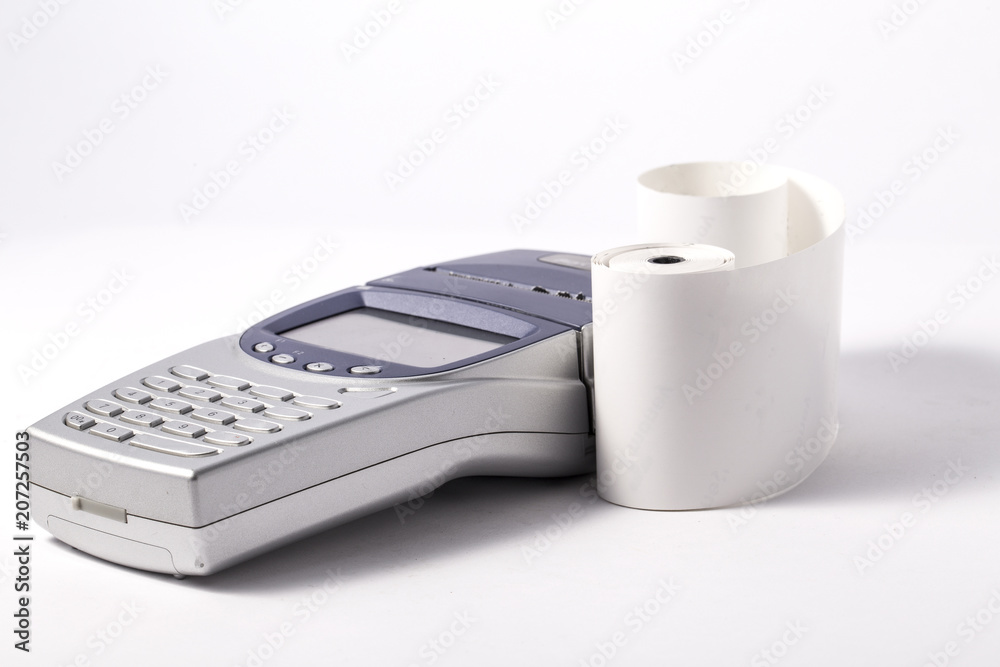 Credit card reader and receipt isolated on white background Credit card reader and receipt isolated on white background