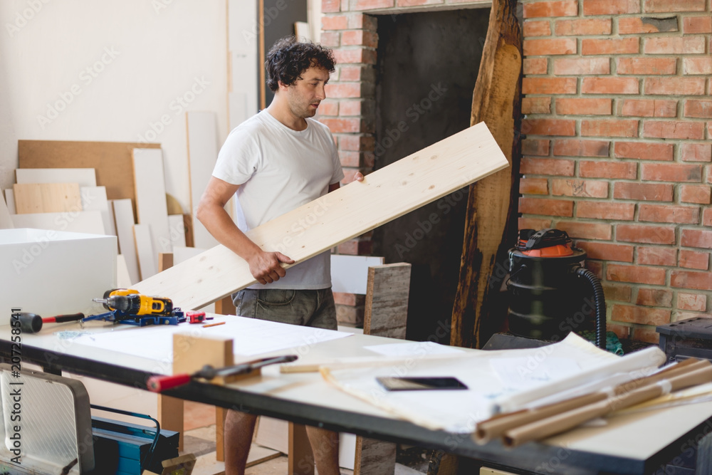 Carpenter working with wood Carpenter working with wood