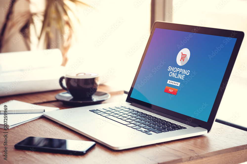 Fototapeta premium online shopping website on computer laptop blue screen background with password for security payment online. shop online lifestyle, e-commerce and security payment protection concept