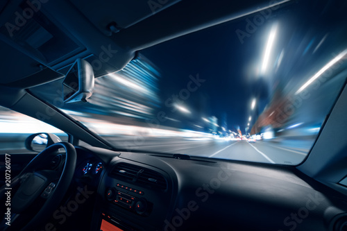 Car speed drive on the road in night city © Ivan Kurmyshov