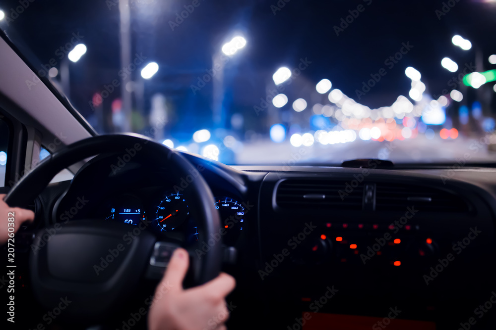 Car speed drive on the road in night city