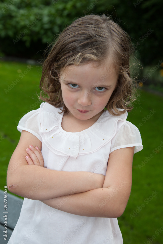 child kid girl makes her head and sulks out child kid girl makes her head and sulks out