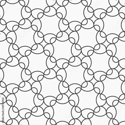 Abstract seamless pattern with regularly repeating geometrical shapes.