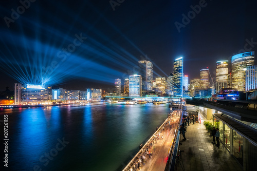 Colorful lights and lasers illuminate Sydney Skyline at Circular Quay for Vivid Festival 2018 in Sydney, Australia.  © Daniela Photography