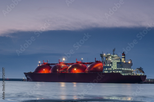 LNG TANKER - Sunrise at the gas terminal and tanker in Swinoujscie