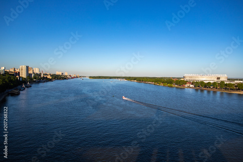 large river, boat floats, top view