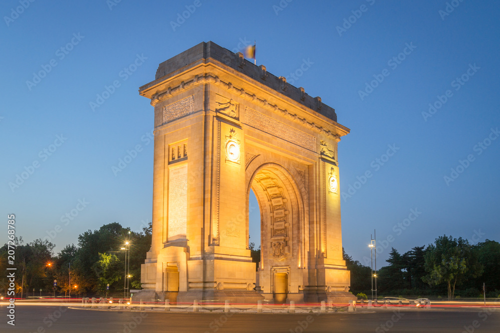 Bucharest, The Triumphal Arch (Arcul de Triumf) at dusk