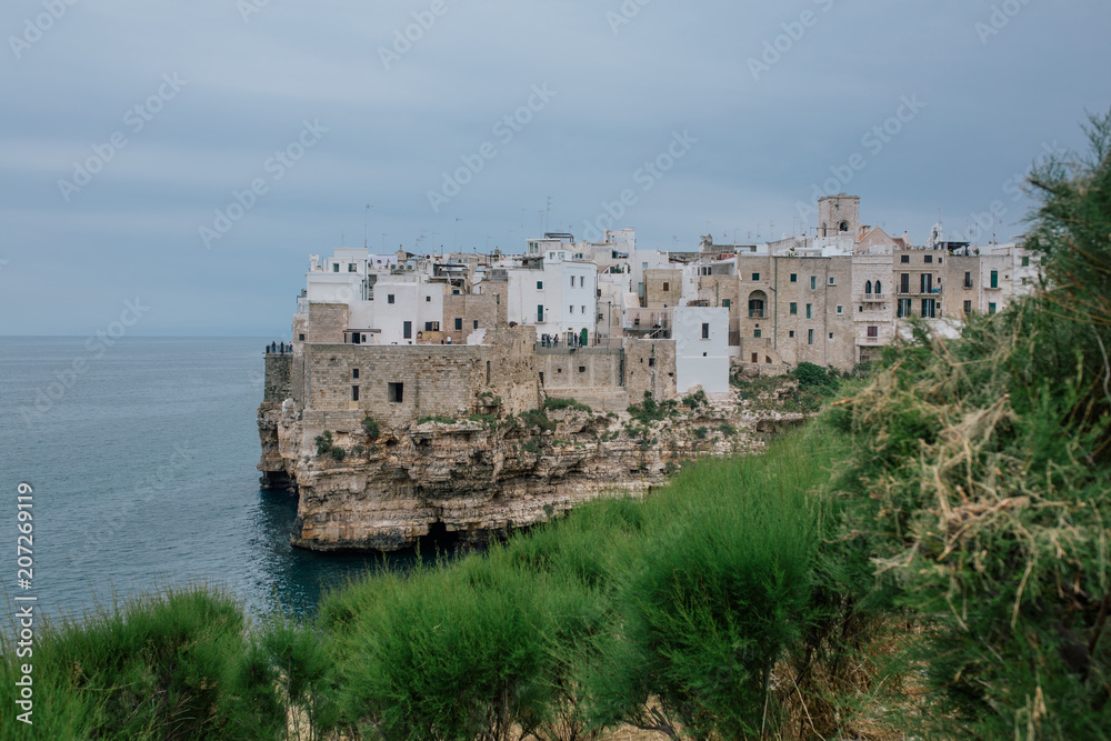 Old vintage houses on the rocks of the coast in Polignano a Mare apulia Italy