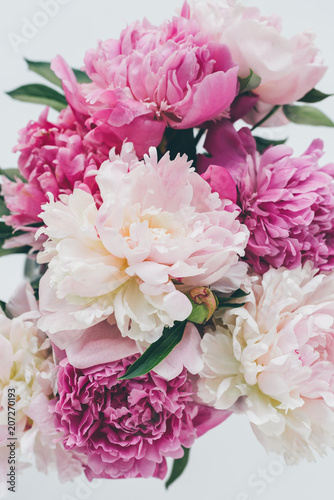top view of beautiful pink peony bouquet on white © LIGHTFIELD STUDIOS